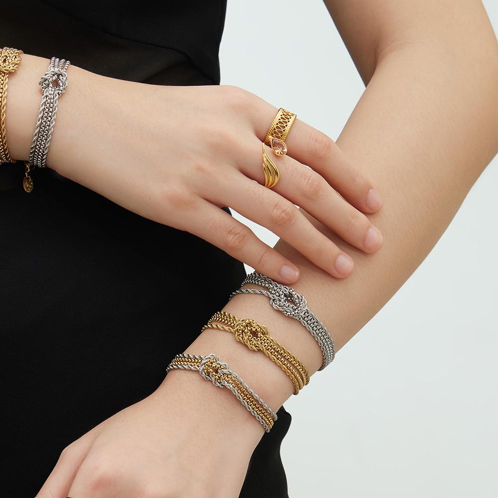 Personalized 18K Gold Electroplated Stainless Steel Knot Chain Bracelet: Modern Versatile European & American Hand Jewelry.