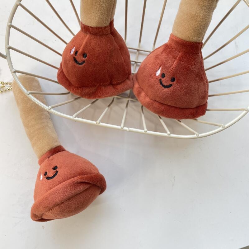 A burr-shaped doll key ring, key holder, key chain, and a bag of charms. Plunger doll keychain