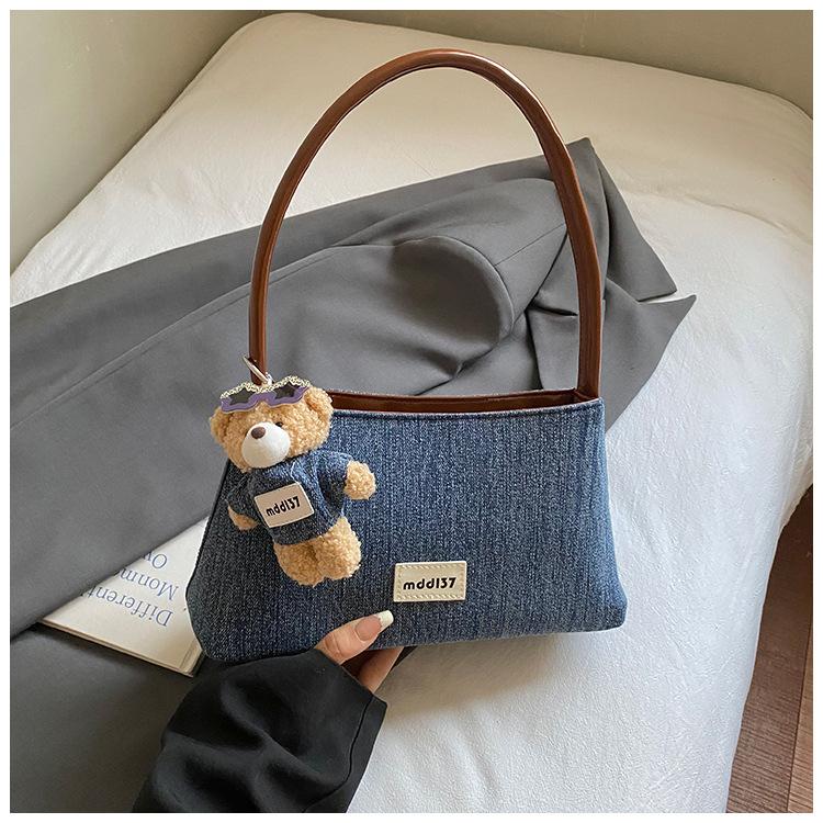 Korean version of denim hand-carried dumpling bag women 2025 new retro niche foreign style casual single shoulder underarm commuter bag