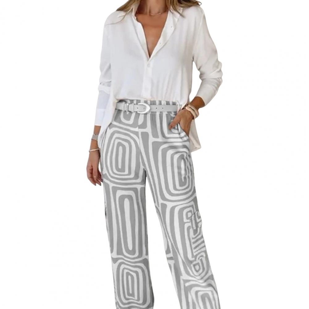 

Комплект из 2 предметов: женская рубашка и брюки, однобортная блузка с длинными рукавами и воротником-лацканами, свободные брюки полной длины с принтом и высокой талией S серый