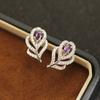 Simple temperament Korean version stone-inlaid purple white feather earrings gold-plated versatile women's stud earrings niche