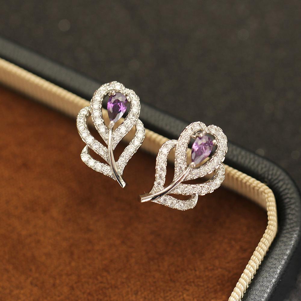 Simple temperament Korean version stone-inlaid purple white feather earrings gold-plated versatile women's stud earrings niche