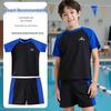 Costume da bagno due pezzi per ragazzo - Patchwork azzurro con maniche raglan (2026)