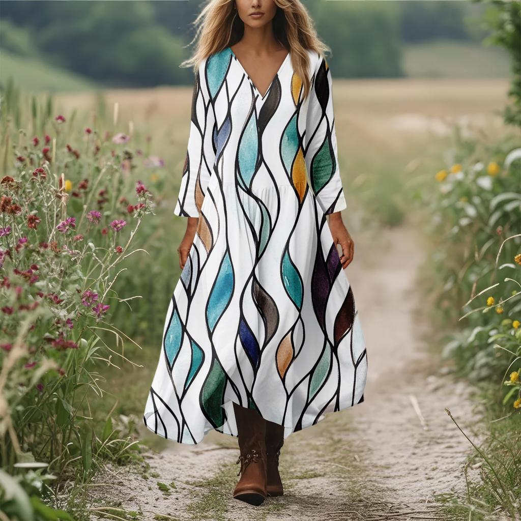 Kvinners avslappede og moteriktige rundhals langermet midilange kjole