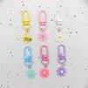 Colorful Daisy Revolving Door Keychain: Cute Heart Bag Charm Pendant