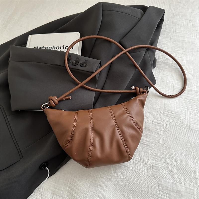 2025 autumn new solid color splicing dumpling bag retro fashion foreign style casual shoulder crossbody armpit bag