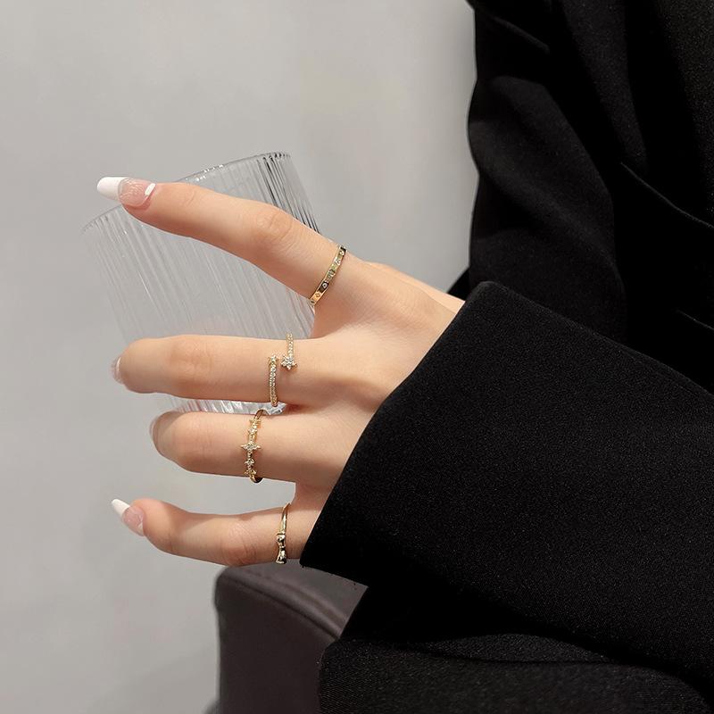 South Korea Dongdaemun Geometric Four-piece Ring Women's Cold Wind Temperament Slightly Inlaid Zircon Index Finger Ring Jewelry