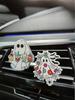 The 2D Acrylic Ghost Car Air Vent Fragrance Clip adds a festive atmosphere and a touch of cuteness to the car interior.