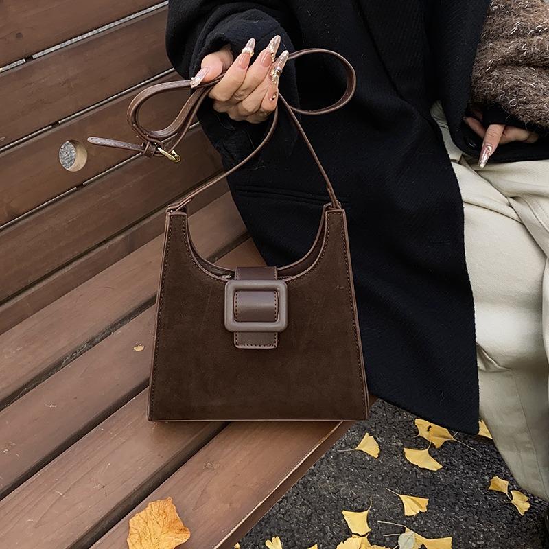 Mode neue Retro-Textur kleine quadratische Tasche Damen einfache einfarbige Schulter-Umhängetasche Tide