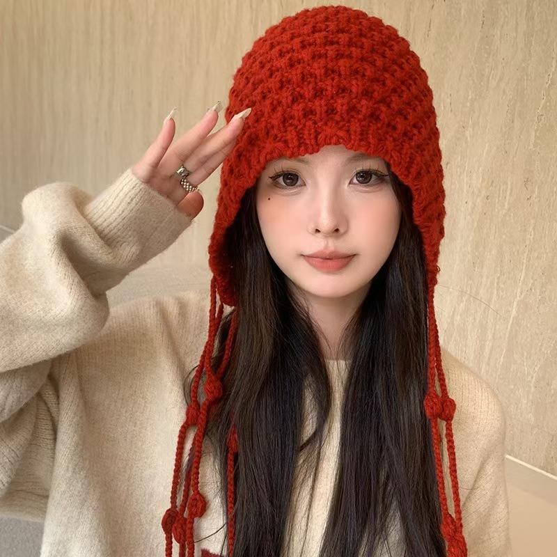 Fashion hand-woven fringed ball wool hat women's warm ear protection straps knitted hat big head circumference pullover hat