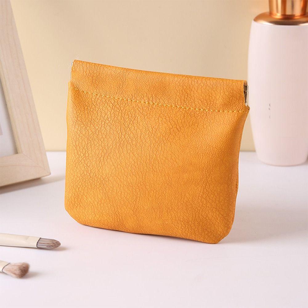 

PU Texture PU Leaf Spring Bag Solid Color Small Item Bags Self-closing Storage Bag Travel оранжевый