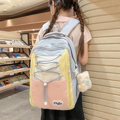 Der neue Schulranzen ist hochwertig, frisch und süß, ein bonbonfarbener Rucksack, ein leichter und großvolumiger Rucksack für Schüler der Unterstufe.