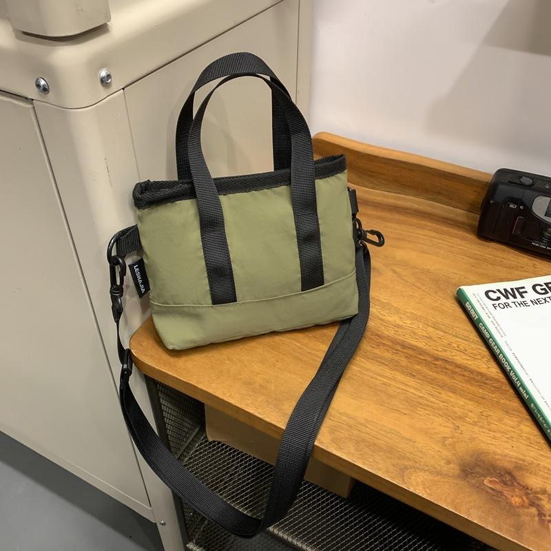 Crossbody bag women's small bag 2025 new foreign style personalized solid color portable simple shoulder bag trendy casual bucket bag