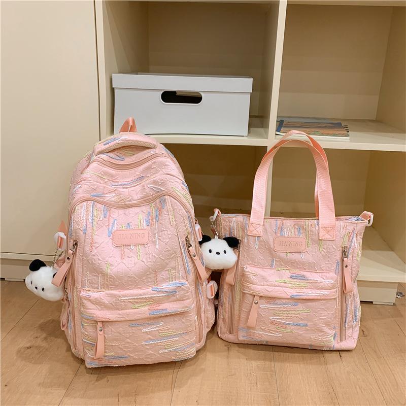 New Large-capacity Backpack, Popular Burden-reducing Schoolbag for Junior High School and High School Students, College Student Women's Travel Bag.