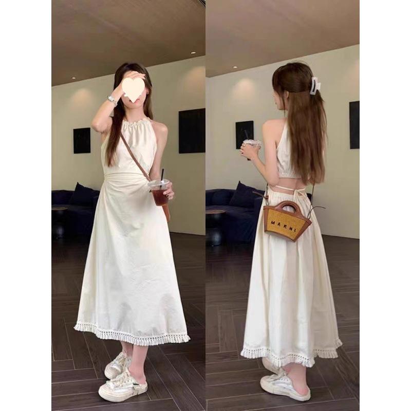 Design sense hollow waist hanging neck suspender dress women's summer lace-up waist thin holiday merry Suzhong long dress