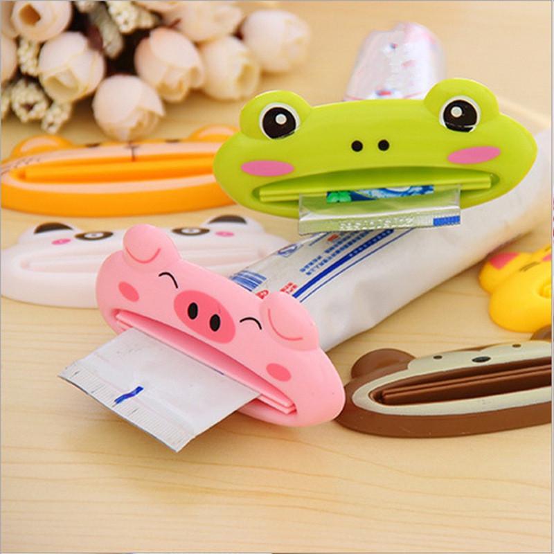 

HOT Plastic CartoonTube Rolling Holder Squeezer Toothpaste Dispenser Easy Use Press Squeezing Tool Home Bathroom Accessories белый