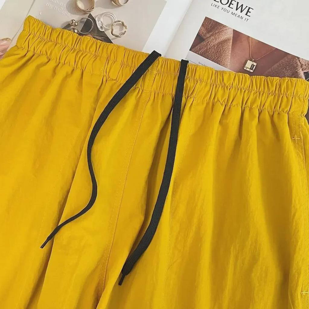 Elastischer Bund Schnelltrocknend Unisex Street Shorts: Bonbonfarbe, Leichtgewicht, Lockere Passform für Laufen und Strandaktivitäten.