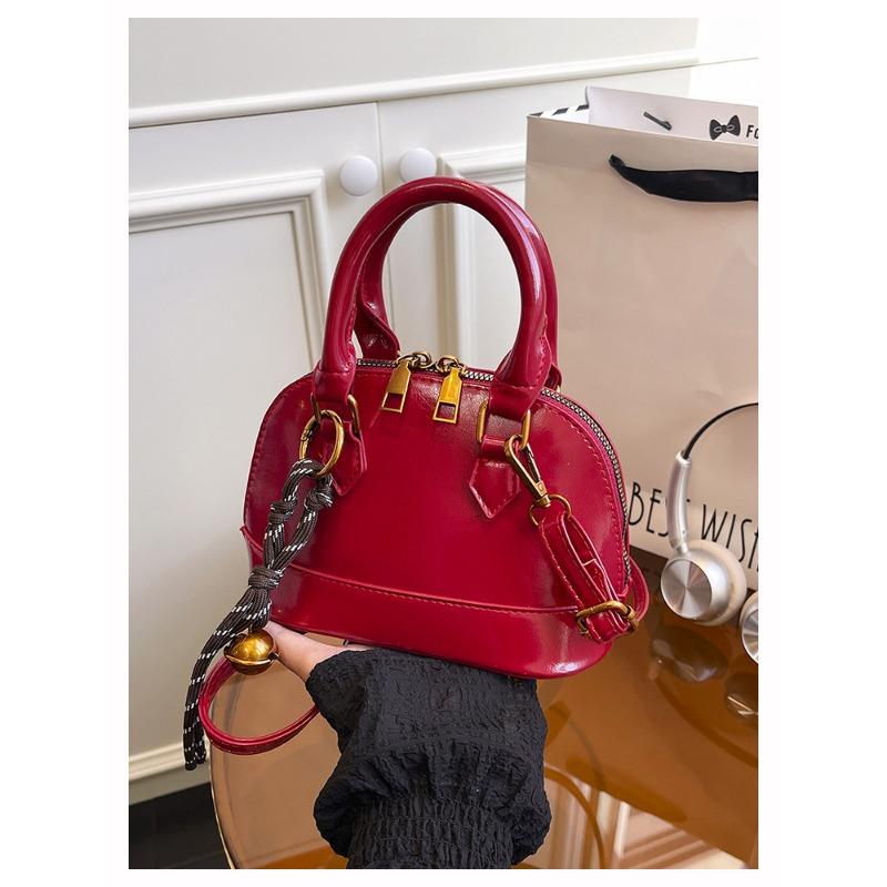 Die Handtasche ist modisch und retro, die Umhängetasche ist stilvoll und die Crossbody-Muscheltasche ist stilvoll