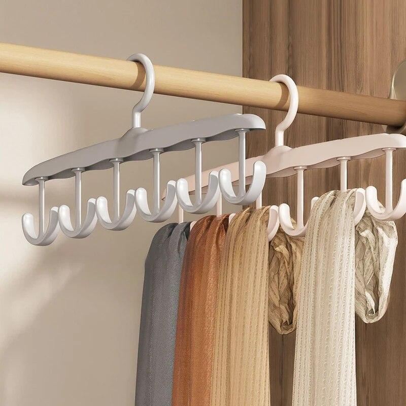 Multifunktionale Kleiderbügelständer unterstützen das kreisförmige Trocknen von Schals und Socken aus Kunststoff und sind Aufbewahrungsregale für Krawattengürtel und BHs