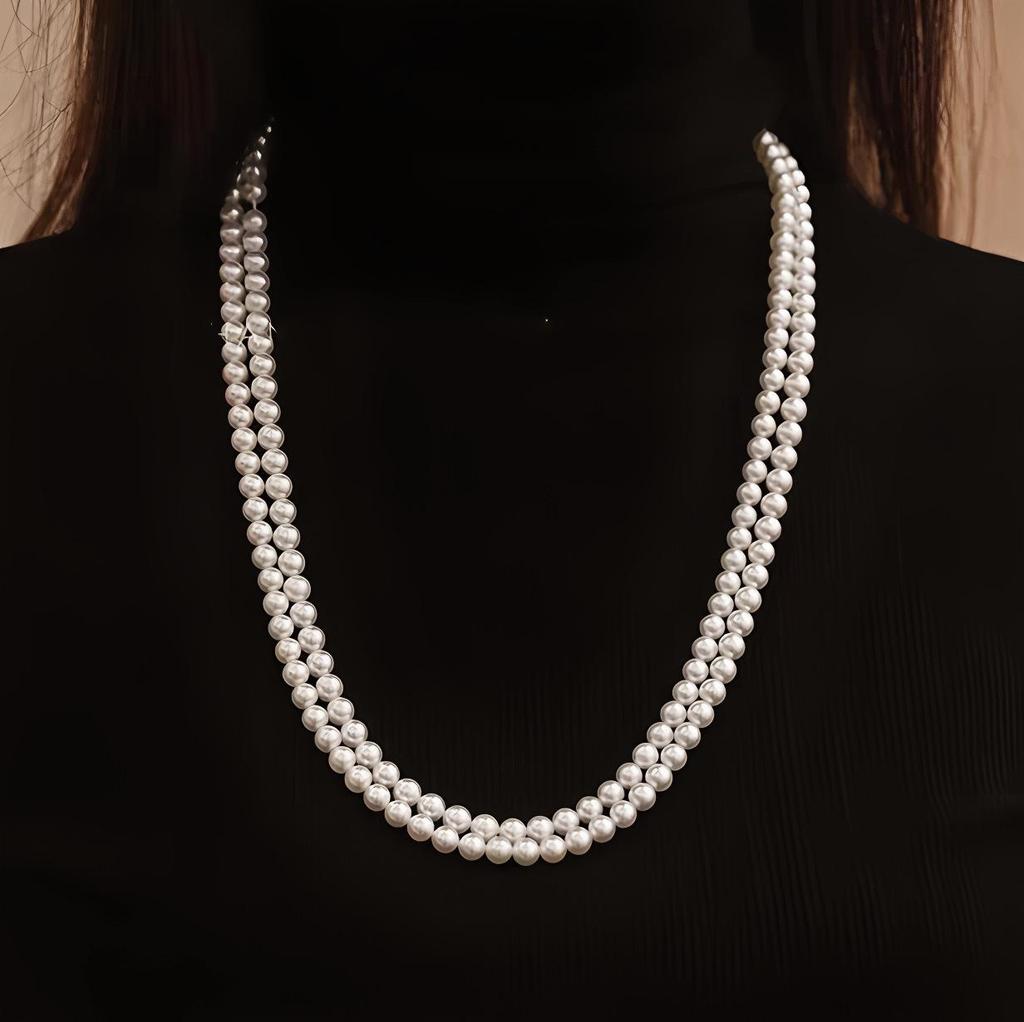 Elegant Retro Pearl Double-Layer Necklace: Small Fragrance Style, Versatile for Sweaters, Perfect Cross-Border Accessory for Women.