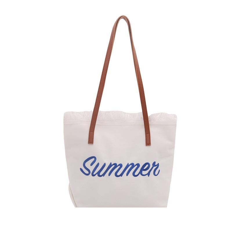 New Letter Tassel Canvas Bag Women's Versatile Largecapacity Simple Commuter Student Shoulder Tote Bag
