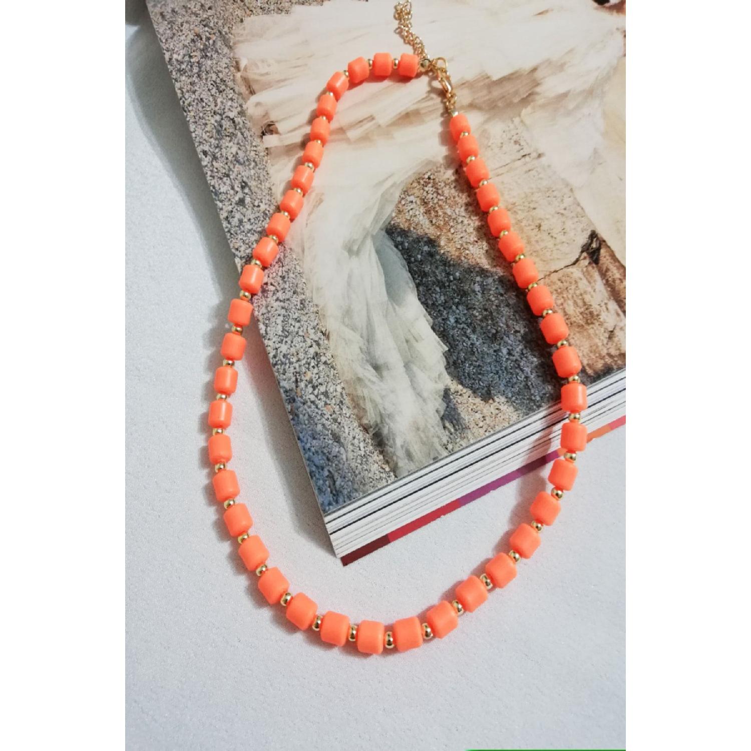 

Ожерелье Fimo с шариками и лино-бусами оранжевого цвета 42 cm