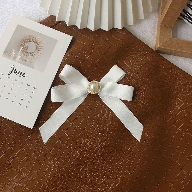 Off-White Cotton Pearl Bow Brooch: Cute Japanese Korean Style Ribbon Lapel Pin Corsage.