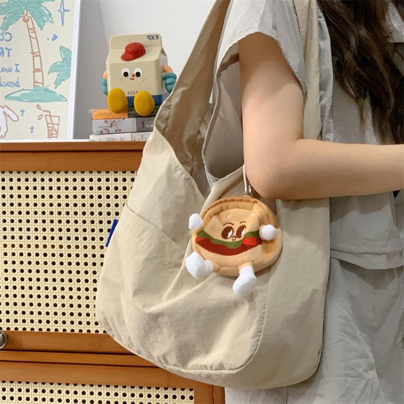 Japon et Corée du Sud sac fourre-tout couleur unie style décontracté pour femme sac à bandoulière polyvalent décontracté pour les trajets quotidiens grande capacité sac pour étudiants cours soutien scolaire