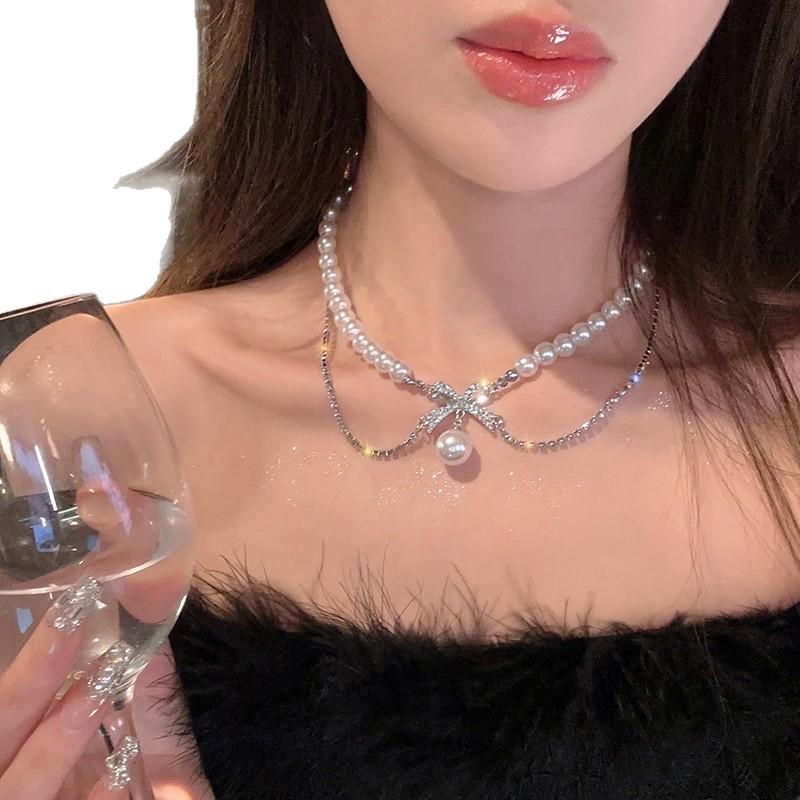 Romantisk flukt dobbeltlags sløyfe perlekjede dame lett luksus nisje frisk og søt kragebenskjede halskjede tide