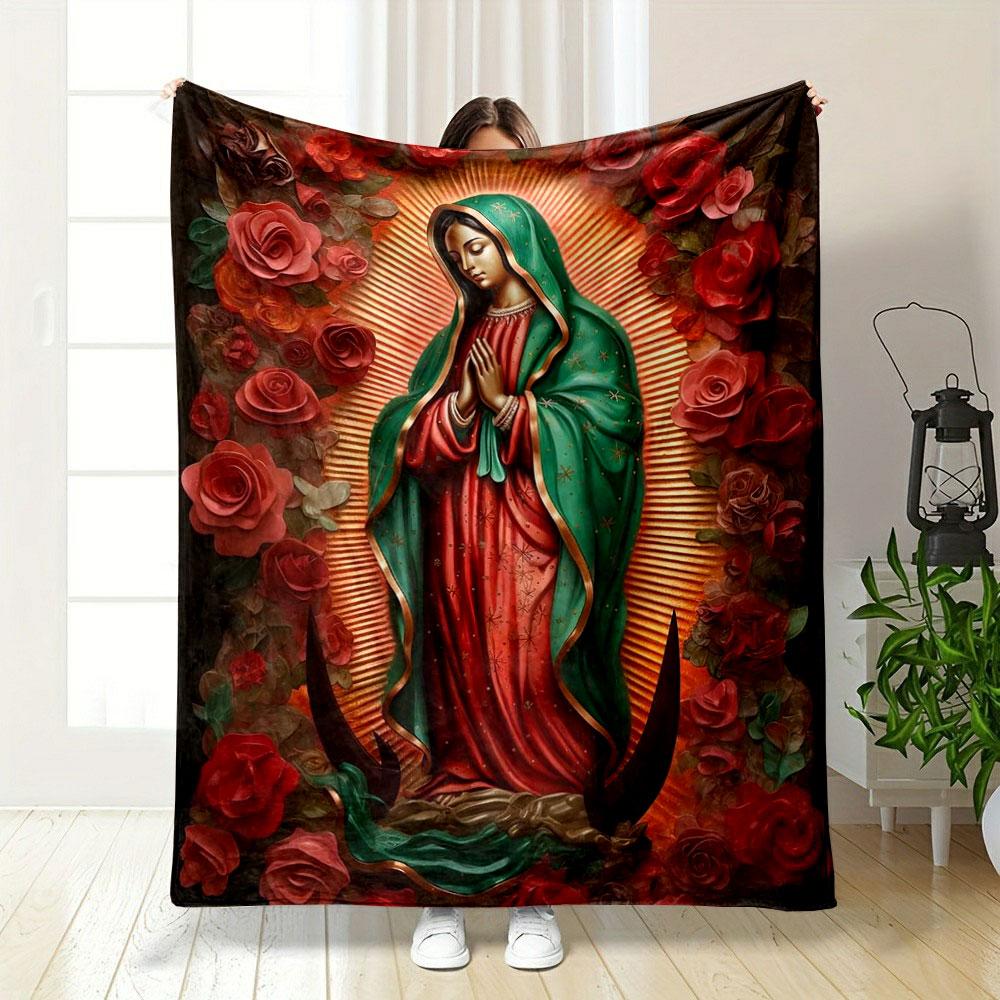 A religious figure with a radiant backdrop, surrounded by red roses. for all seasons blanket lunch break throw gift