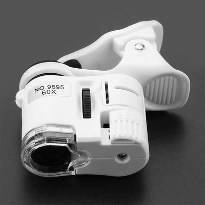 Lupa Portátil 60X Lupa Con Luz Microscopio con Zoom Lupa Luz LED UV Clip-On Micro Lente Para Teléfonos Móviles Universales