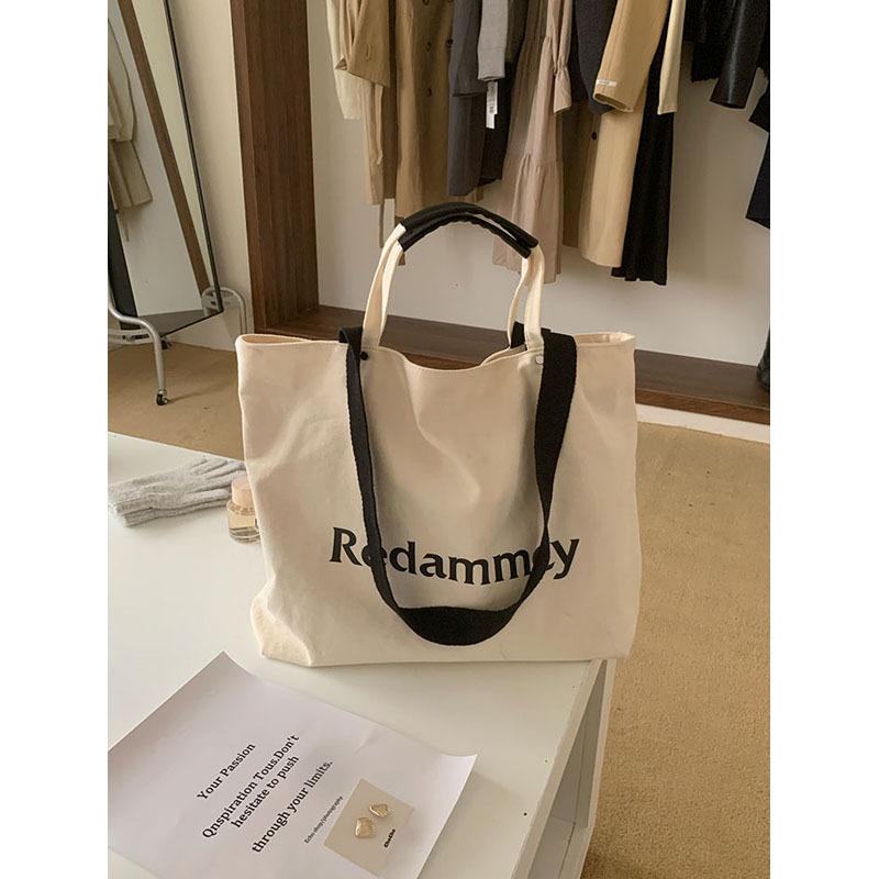 Korean Casual and Versatile Commuter Canvas Bag for Women's Large Capacity Shoulder Bag Hand Tote Bag Student Carrying Book Bag