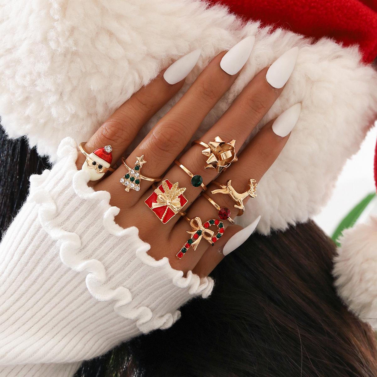 8-Piece European Christmas Rhinestone Ring Set: Tree, Santa, Bowtie & Reindeer Designs