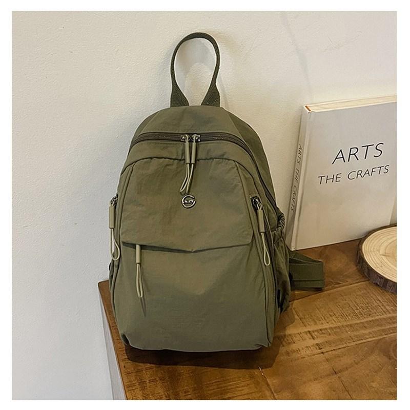 

Backpack ultra-light 06 new high-end niche nylon canvas to work commuter travel backpack small and lightweight Standard армія зелений колір