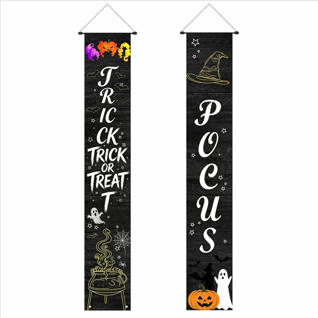 Halloween flags decorate the courtyard for an outdoor party. Cartoon doors hang with festive backdrop cloth. Halloween couplets.