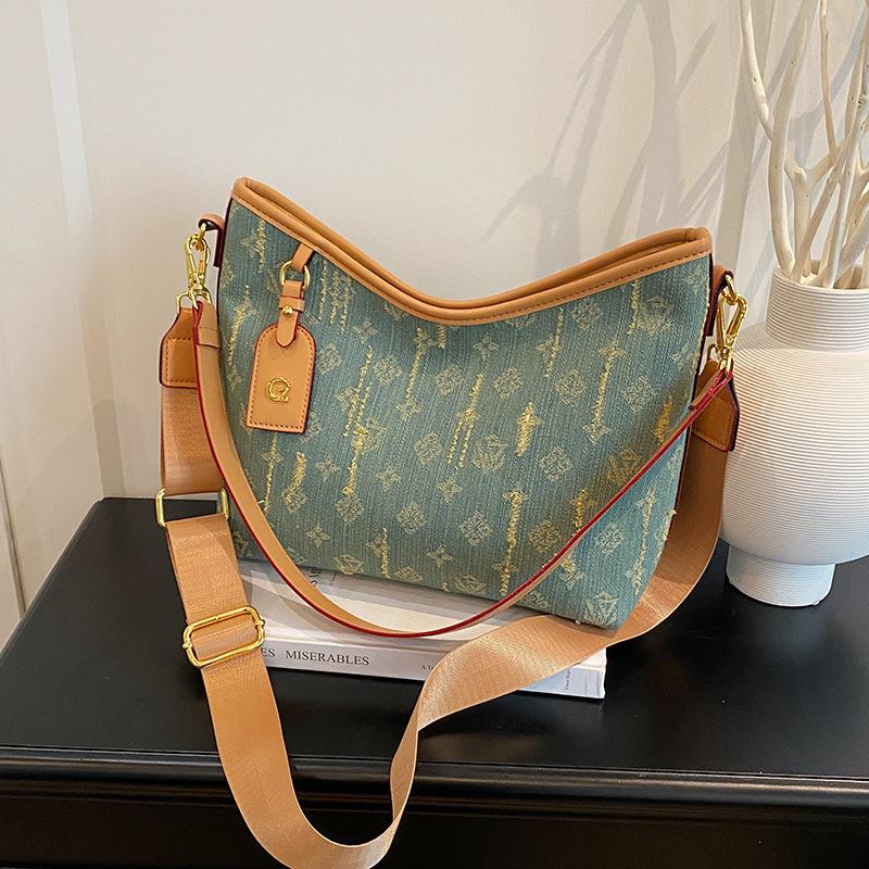 

Новая сумка женская сумка-тоут джинсовая с принтом женская сумка через плечо цветовая гамма атмосферная сумка-мессенджер для通勤 женская 24cm*13cm*30cm