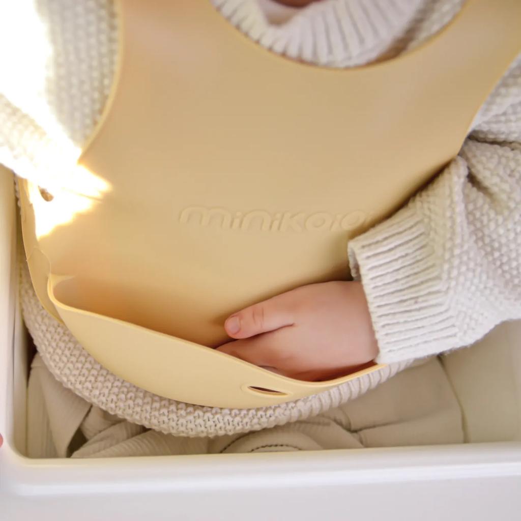 Silicone Bib for Children with Pocket for Dishes Yellow MinikOiOi 1 Pc.