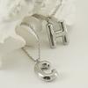 Fashionable Plump Stainless Steel Alphabet Necklace For Women