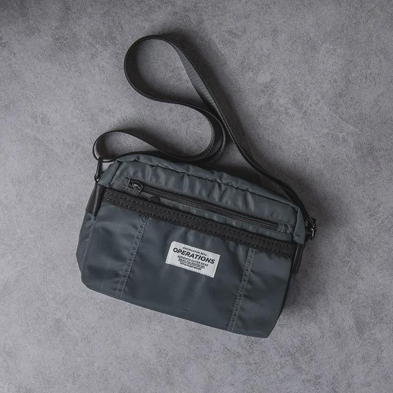 Herren Oxford Stoff Lässige Messenger Umhängetasche: Neuer Trend in der amerikanischen Street Fashion.