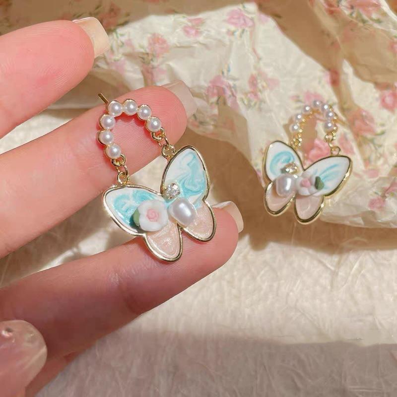 

Sweet wind oil painting three-dimensional butterfly flower earrings, exquisite design personalized versatile earrings women
