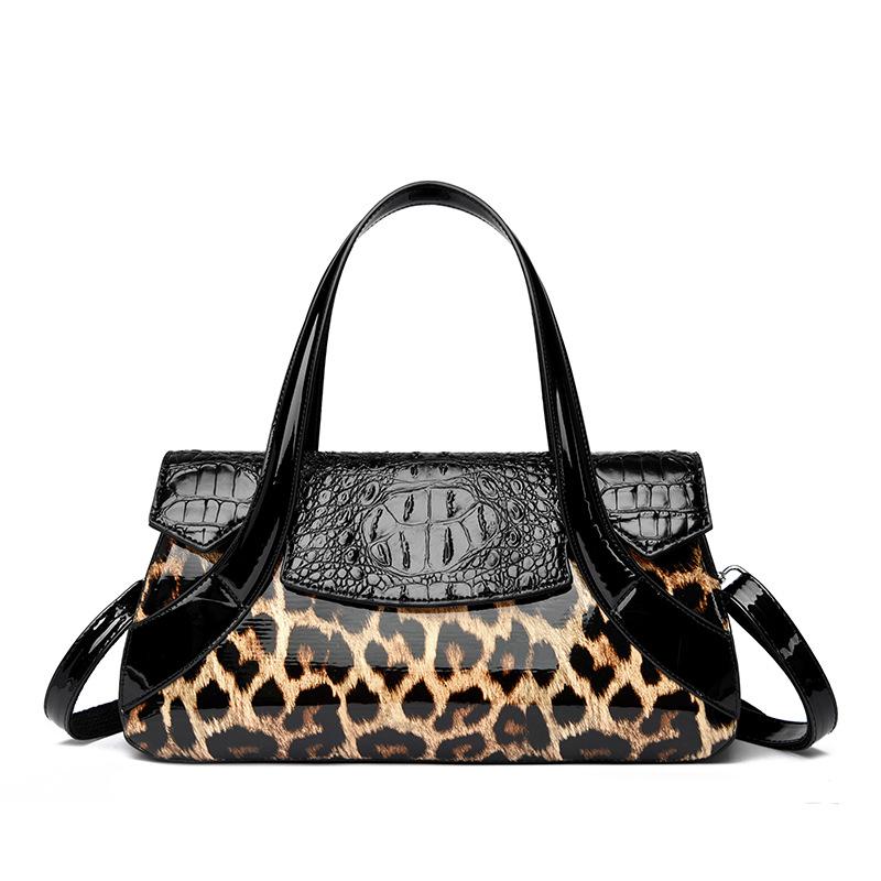 

Эта Сумка - Женская сумка большой вместимости с узором под крокодила. Можно носить в руке, на плече или через плечо цветной печати леопарда