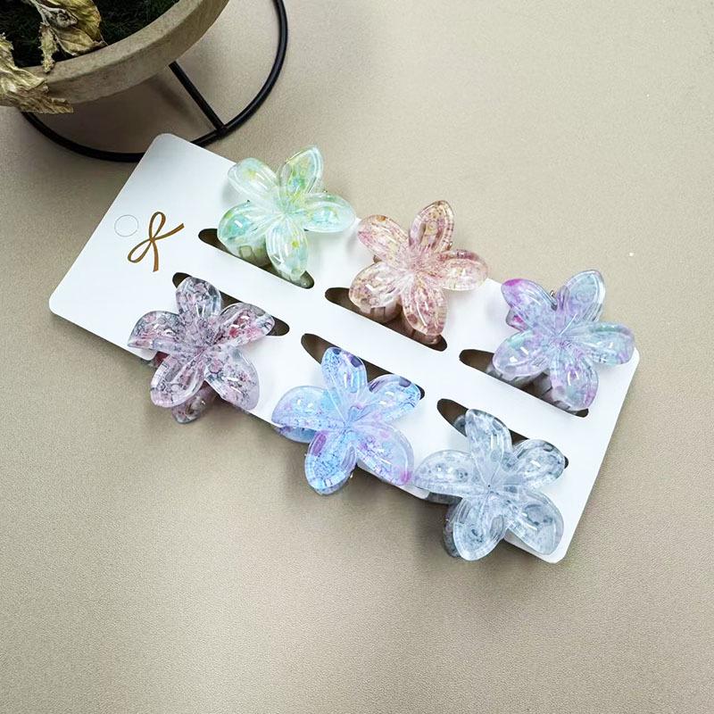 European & American 4CM Frangipani Claw Clip Hairpin - Fashionable Vacation Floral Accessory.