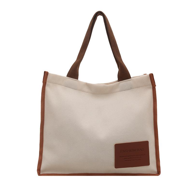 2025 summer new literary and artistic large-capacity class shoulder portable messenger bag casual simple canvas women's bag