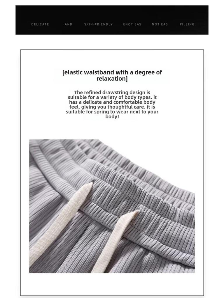 Lässige weiße Jogginghose mit weitem Bein für Herren im Sommer – trendiger, lockerer High-Street-Stil