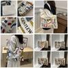 Large Capacity Stylish Canvas Tote Bag With Vibrant Letter Print Design For Everyday Use