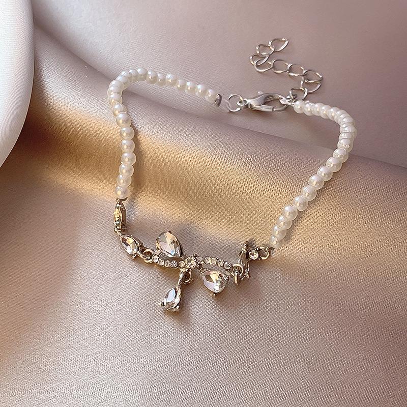 2025 Trendy Pearl Zircon Flower Bow Bracelet: Women's Chic, High-End, Versatile Design