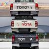 Naklejki z literami na tylną klapę Toyoty Hilux - Dekoracyjne naklejki do pickupów