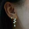 Natural freshwater pearl grape ear love stud earrings niche design strong light baroque earrings silver needle earrings stacked wear