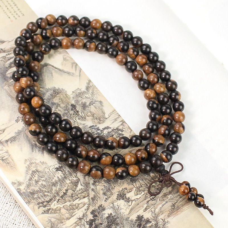 

Прямые продажи с фабрики Африканские молитвенные бусины Ювелирное изделие Подарок Эбеновое дерево About 108 beads with a diameter of 6mm