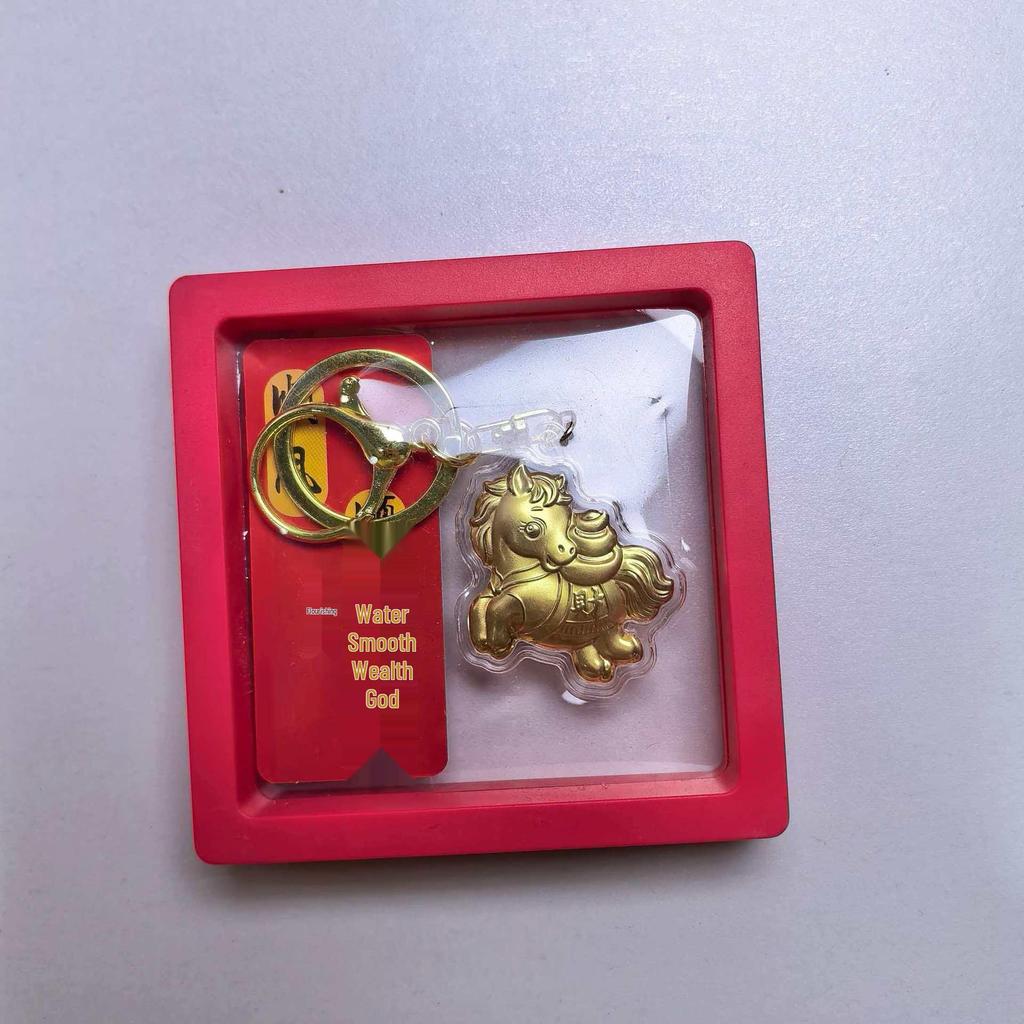 Golden Pony Pendant 2026: Year of the Horse Pure Gold 999 Keychain for Wealth and Traffic Safety.